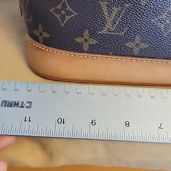 LOUIS VUITTON Alma monogram - Picture 11 of 16